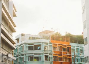 Vibrant cityscape of contemporary architecture in Bangkok, showcasing colorful residential buildings.